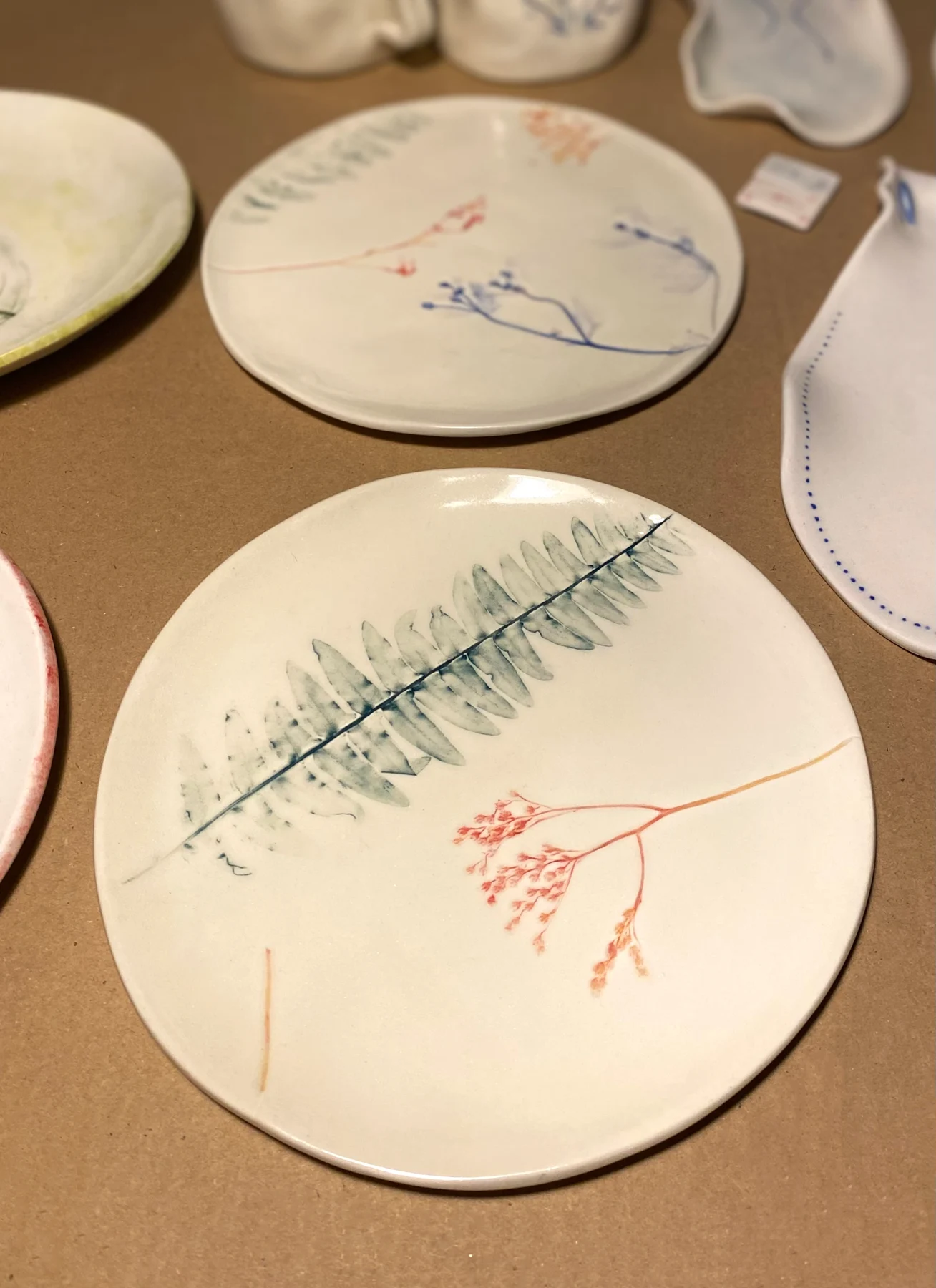Round plates with colourful botanical prints