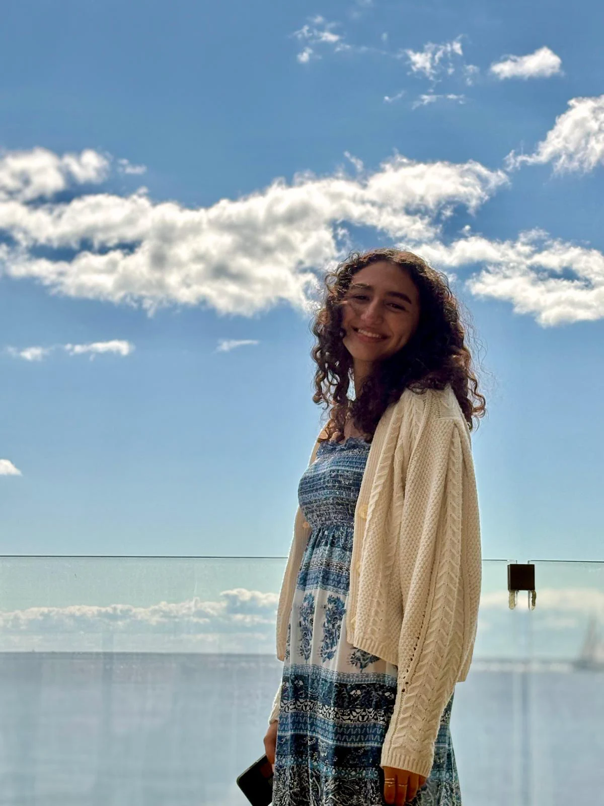 Verina Daoud outdoors beside the sea