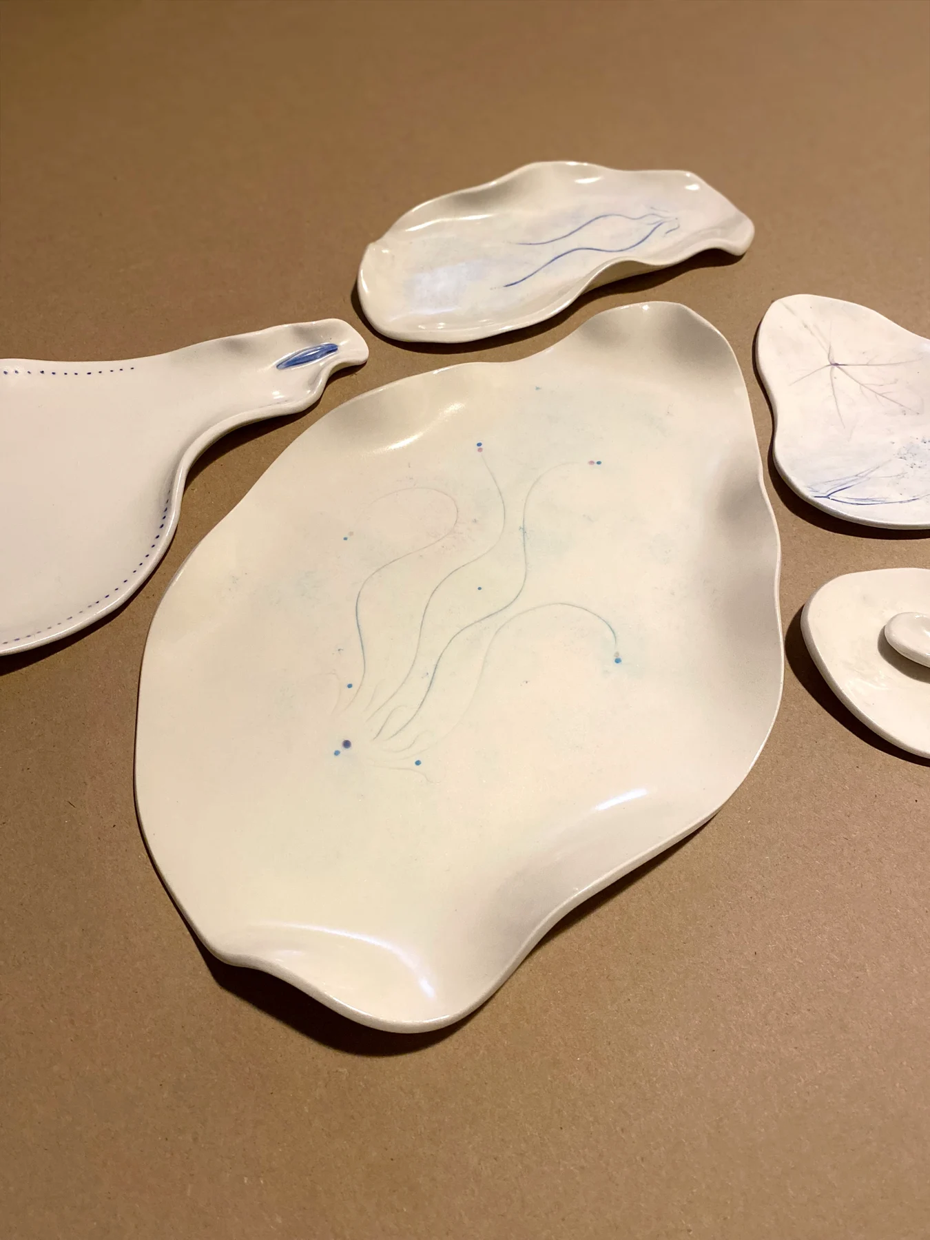 Organic shaped plates with delicate botanical surface details